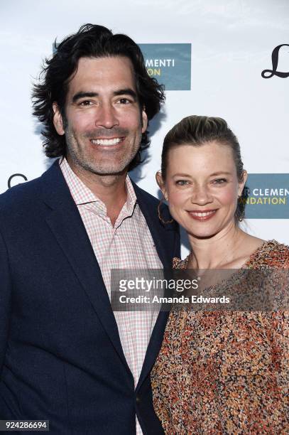 Television personality Carter Oosterhouse and actress Amy Smart arrive at the Mitchell Gold + Bob Williams Birthday Bash to benefit The Tyler...