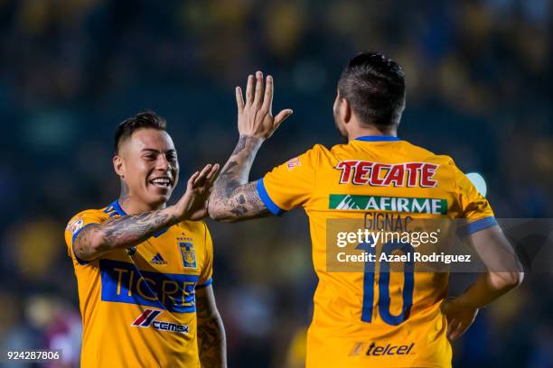 Andre-Pierre Gignac of Tigres celebrates with teammate Eduardo Vargas after scoring his team's first goal during the 9th round match between Tigres...