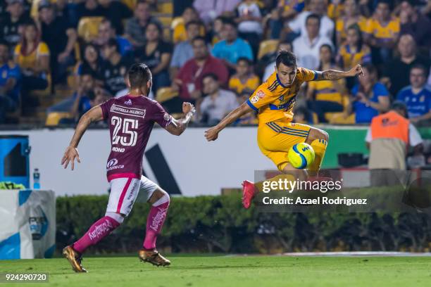 Lucas Zelarayan of Tigres fights for the ball with Mario Osuna of Morelia during the 9th round match between Tigres UANL and Morelia as part of the...