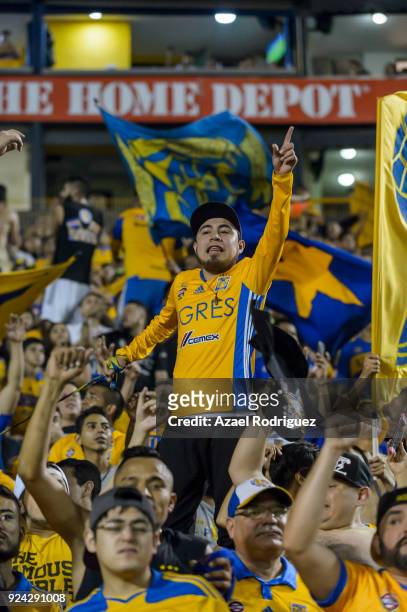 Fans of Tigres cheer their team during the 9th round match between Tigres UANL and Morelia as part of the Torneo Clausura 2018 Liga MX at...
