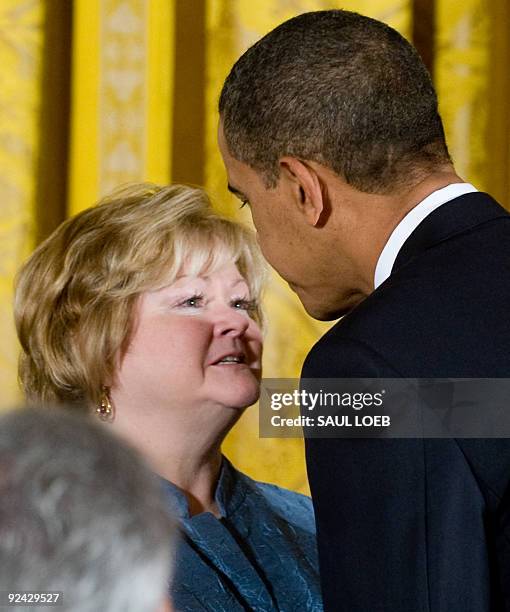 President Barack Obama speaks with the mother of Matthew Shepard, Judy Shepard after Obama spoke in honor of the enactment of the Matthew Shepard and...