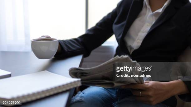 business workplace with coffee cup on table - newspaper on table stock pictures, royalty-free photos & images