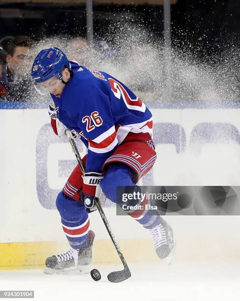 Jimmy Vesey of the New York Rangers takes the puck in the first period against the Detroit Red Wings on February 25, 2018 at Madison Square Garden in...