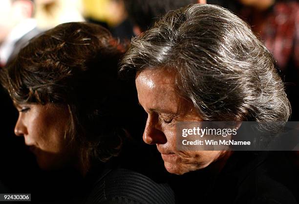 Karen Dixon and her spouse Nan Schaffer attend a White House reception where U.S. President Barack Obama delivered remarks on the enactment of the...