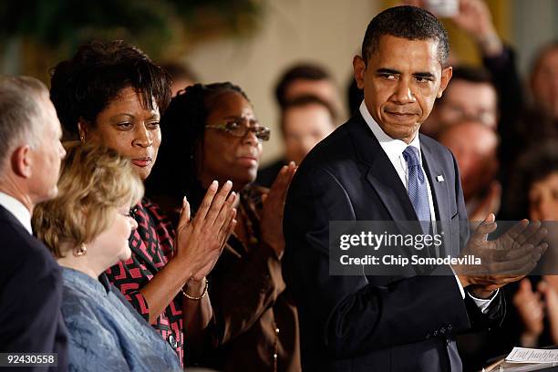 President Barack Obama applauds after delivering remarks following the enactment of the Matthew Shepard and James Byrd, Jr. Hate Crimes Prevention...