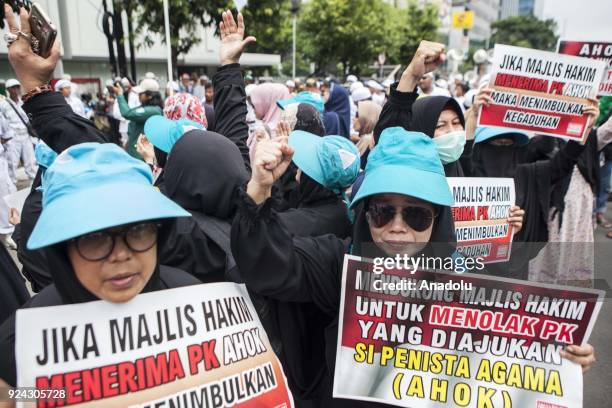 Group of Anti-Ahok people shout slogans outside the court during judicial review of former Governor of Jakarta, Basuki Thahaja "Ahok" Purama...