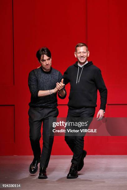 Designers Guillaume Meilland and Paul Andrew walk the runway at the Salvatore Ferragamo Ready to Wear Fall/Winter 2018-2019 fashion show during Milan...
