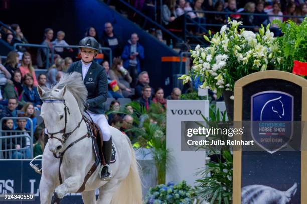 Swedish equestrian Stephanie Holmen on Clarence rides in the Accumulator Show Jumping Competition during the Gothenburg Horse Show in Scandinavium...