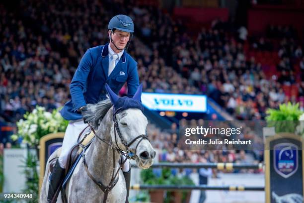 German equestrian Daniel Deusser on Cornet rides in the Accumulator Show Jumping Competition during the Gothenburg Horse Show in Scandinavium Arena...