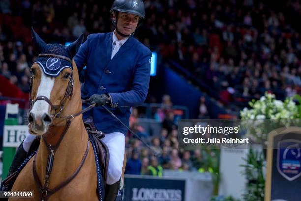 French equestrian Cedric Angot on Talent des Moltiers rides in the Accumulator Show Jumping Competition during the Gothenburg Horse Show in...