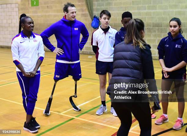 Dina Asher-Smith and Richard Whitehead take part in a school athletics training session during the 2018 Muller Anniversary Games Launch at Jubilee...
