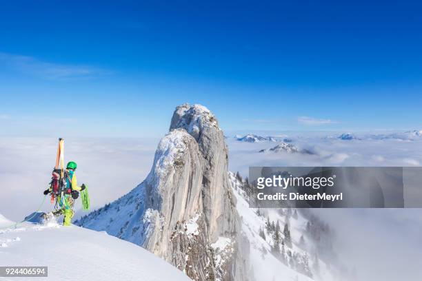 cross country skiier - freerider at the way to summit - mount kampenwand, alps - upper bavaria stock pictures, royalty-free photos & images