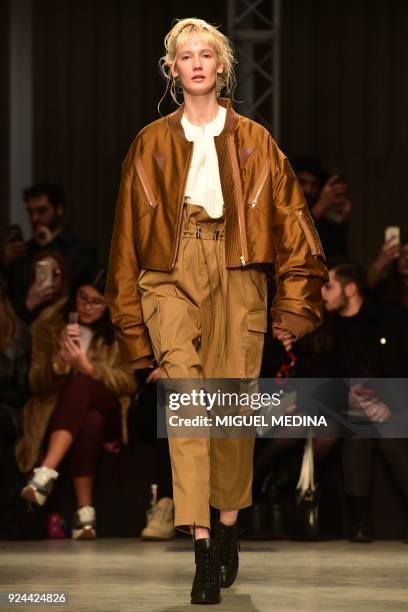 Model presents a creation by Atsushi Nakashima during the women's Fall/Winter 2018/2019 collection fashion show, in Milan, on February 26, 2018. /...