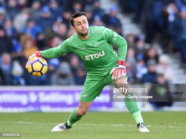 Lukasz Fabianski of Swansea City passes the ball during the Premier League match between Brighton and Hove Albion and Swansea City at Amex Stadium on...