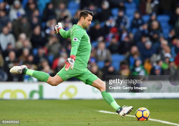 Lukasz Fabianski of Swansea City passes the ball during the Premier League match between Brighton and Hove Albion and Swansea City at Amex Stadium on...