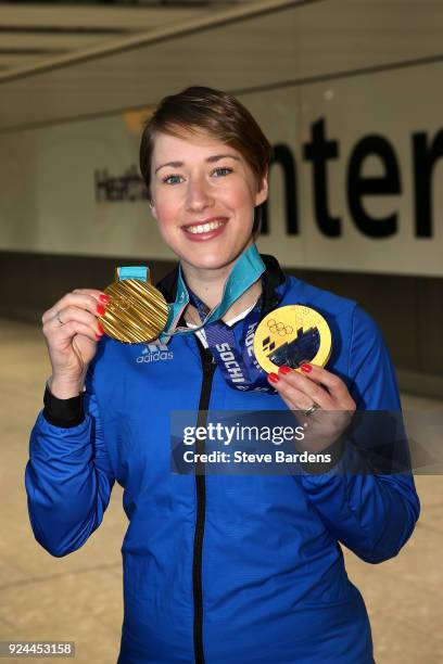 Lizzy Yarnold of Great Britain poses with her Skeleton gold medals from Sochi 2014 and PyeongChang Winter Games during the Team GB Homecoming from...