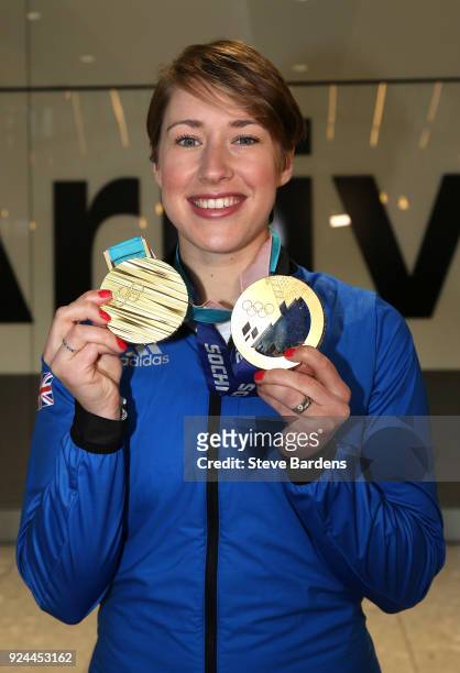 Lizzy Yarnold of Great Britain poses with her Skeleton gold medals from Sochi 2014 and PyeongChang Winter Games during the Team GB Homecoming from...