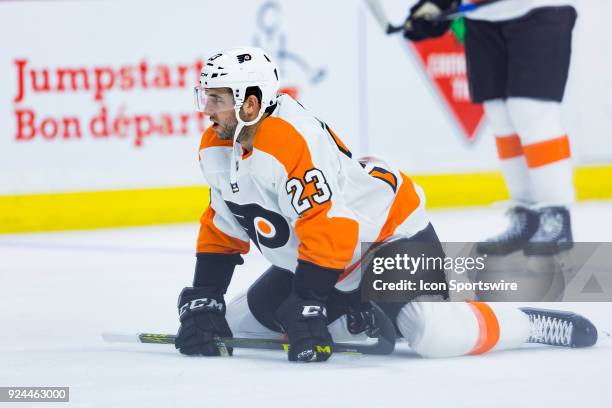 Philadelphia Flyers Defenceman Brandon Manning stretches during warm-up before National Hockey League action between the Philadelphia Flyers and...