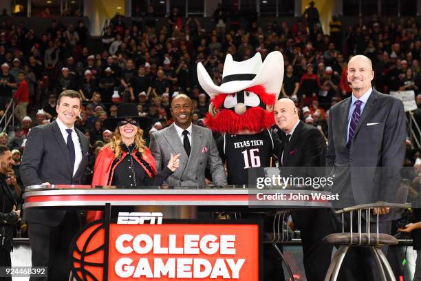College Gameday hosts, Rece Davis, Jay Williams, Seth Greenberg and Jay Bilas pose with the Texas Tech Red Raiders mascots prior to the game between...