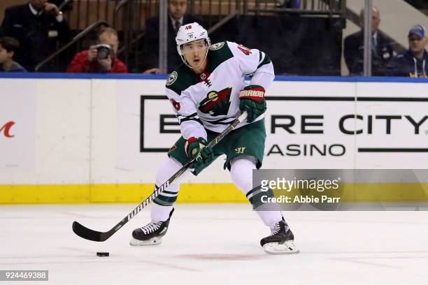 Jared Spurgeon of the Minnesota Wild skates with the puck in the third period against the New York Rangers during their game at Madison Square Garden...