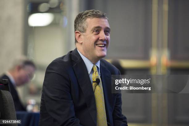 James Bullard, president and chief executive officer at the Federal Reserve Bank of St. Louis, smiles during the National Association of Business...