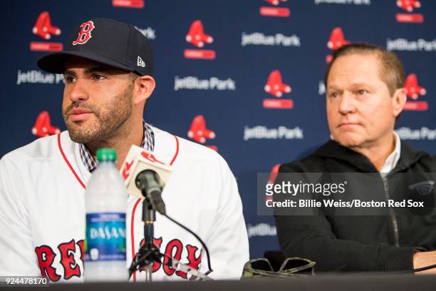 Martinez of the Boston Red Sox reacts with agent Scott Boras as he speaks during a press conference announcing his signing on February 26, 2018 at...