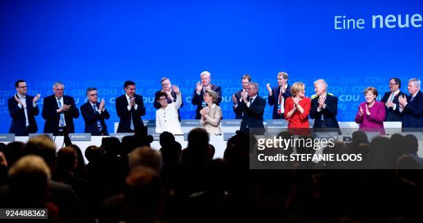 Saarland's State Premier and designated secretary general of the Christian Democratic Union Annegret Kramp-Karrenbauer is applauded by party...