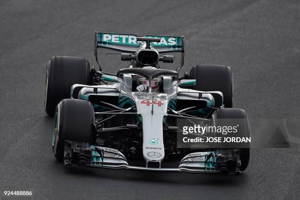 Mercedes' British driver Lewis Hamilton drives at the Circuit de Catalunya on February 26, 2018 in Montmelo on the outskirts of Barcelona during the...