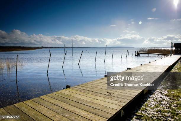 Glowe, Germany Jetty at the Großer Jasmunder Bodden near Glowe on the island of Ruegen on February 05, 2018 in Glowe, Germany.