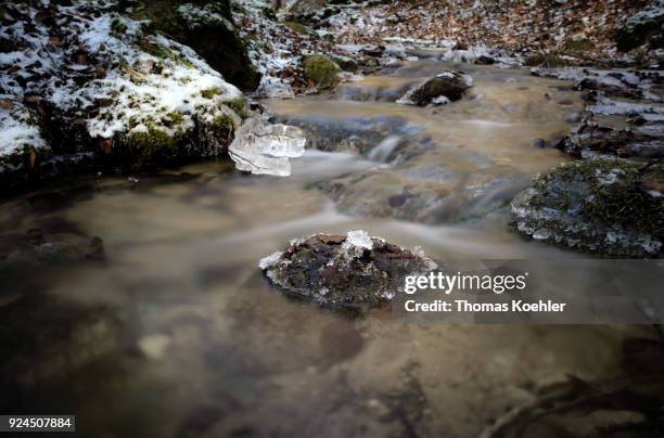 Glowe, Germany Close-up of an iced stream in winter in the Jasmund National Park on the island of Ruegen on February 07, 2018 in Glowe, Germany.