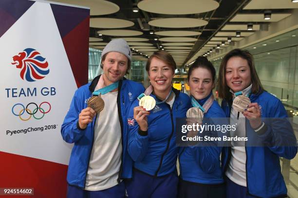 Billy Morgan, Lizzy Yarnold, Laura Deas and Isabel Atkin of Great Britain pose with their Olympic medals during the Team GB Homecoming from the...