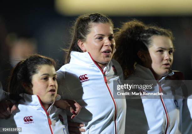 Abbie Scott of England sings the National Anthem during the Natwest Women's Six Nations match between Scotland Women and England Women at Scotstoun...