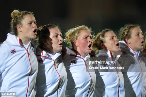 Danielle Waterman of England , and Izzy Noel-Smith , of England sing the National Anthem during the Natwest Women's Six Nations match between...