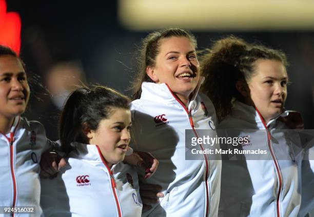Abbie Scott of England sings the National Anthem during the Natwest Women's Six Nations match between Scotland Women and England Women at Scotstoun...