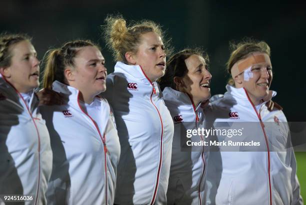 Amber Reid of England sings the National Anthem during the Natwest Women's Six Nations match between Scotland Women and England Women at Scotstoun...