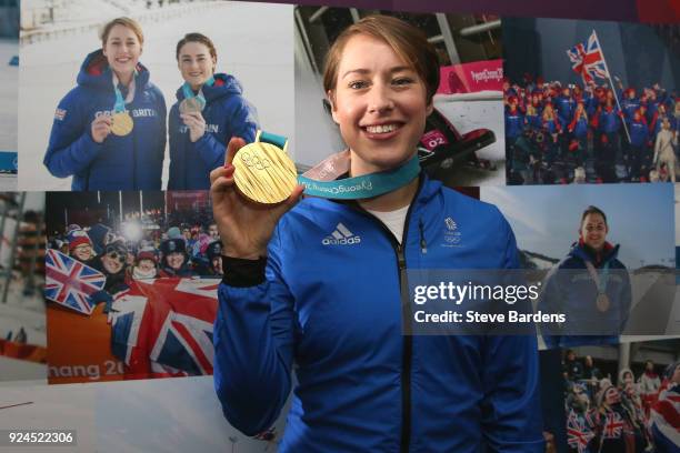 Lizzy Yarnold of Great Britain poses with her skeleton gold medal during the Team GB Homecoming from the Winter Olympics at Heathrow Airport on...