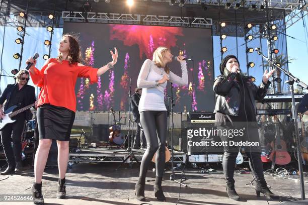Singers Wendy Wilson , Chynna Phillips and Carnie Wilson of the band Wilson Phillips perform onstage during the One 805 Kick Ash Bash benefiting...