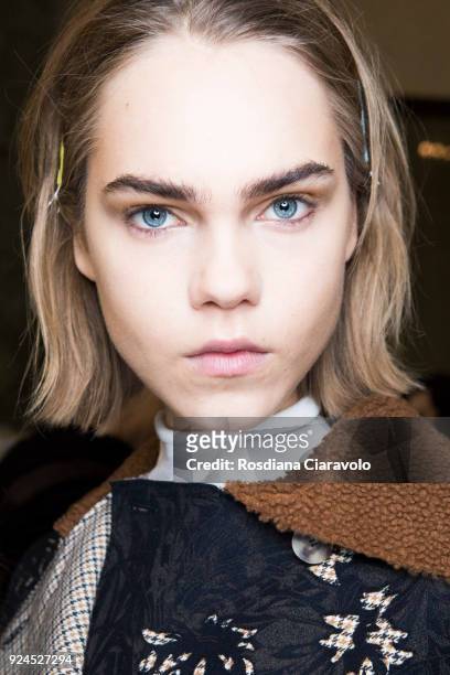 Model is seen backstage ahead of the Gabriele Colangelo show during Milan Fashion Week Fall/Winter 2018/19 on February 24, 2018 in Milan, Italy.