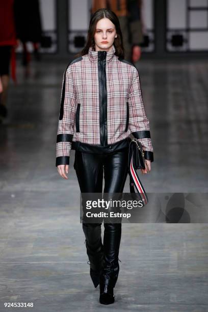 Model walks the runway at the Trussardi show during Milan Fashion Week Fall/Winter 2018/19 on February 25, 2018 in Milan, Italy.