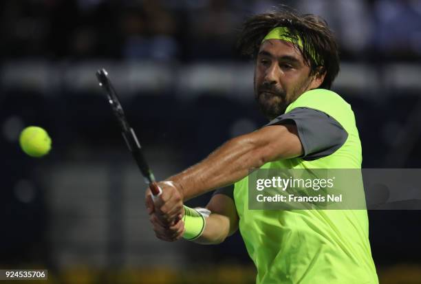 Marcos Baghdatis of Cyprus in action against Victor Troicki of Serbia during day one of the ATP Dubai Duty Free Tennis Championships at the Dubai...