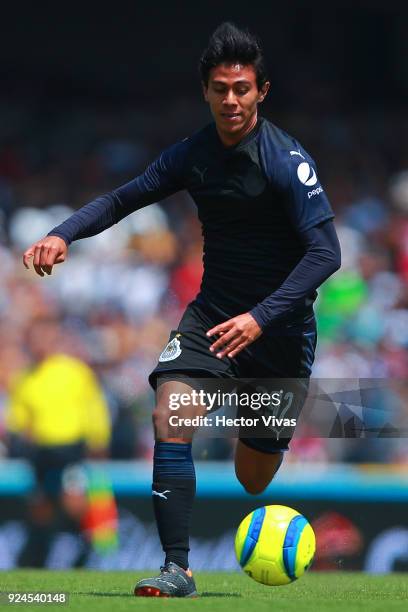 Jose Macias of Chivas drives the ball during the 9th round match between Pumas UNAM and Chivas as part of the Torneo Clausura 2018 Liga MX at...