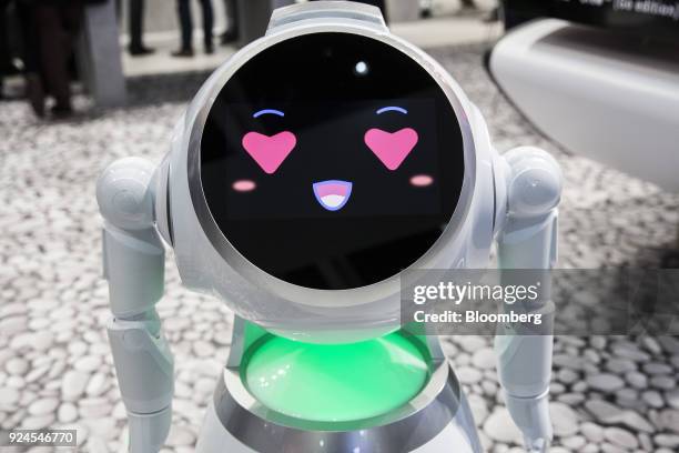 Vestel Group robot displays an animated face during the opening day of the Mobile World Congress in Barcelona, Spain, on Monday, Feb. 26, 2018. At...