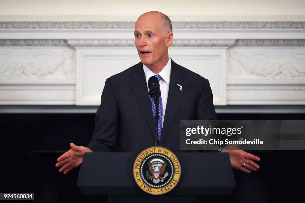 Florida Governor Rick Scott speaks during a business session with state governors hosted by U.S. President Donald Trump in the State Dining Room at...