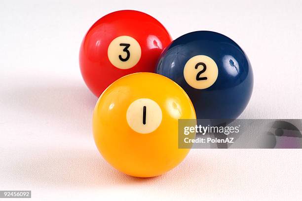 isolated billiards balls numbered one two and three - financiële cijfers stockfoto's en -beelden