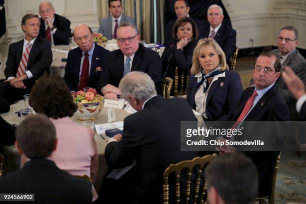 State governors and members of U.S. President Donald Trump's cabinet attend a business session in the State Dining Room at the White House February...