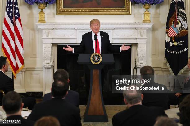 President Donald Trump hosts a business session with state governors in the State Dining Room at the White House February 26, 2018 in Washington, DC....