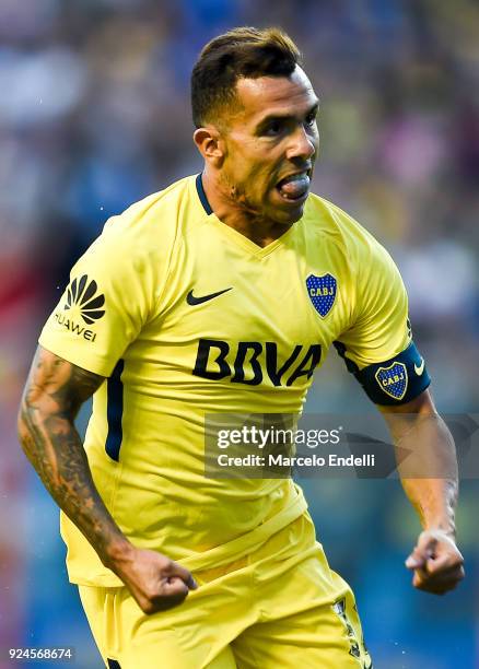 Carlos Tevez of Boca Juniors celebrates after scoring the first goal of his team during a match between Boca Juniors and San Martin de San Juan as...