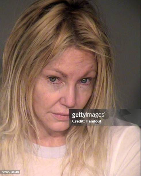 In this handout photo provided by the Ventura County Sheriffs Office, actress Heather Locklear is seen in a police booking photo after her arrest on...