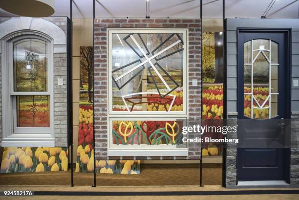 Window and door samples stand on display in the showroom of the Pella Corp. Manufacturing facility in Pella, Iowa, U.S., on Thursday, Feb. 22, 2018...