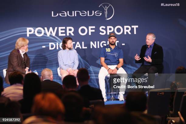 Laureus Academy Chairman Sean Fitzpatrick speaks as Richard Ayers, Jerry Newman and Yuvraj Singh listen during the Laureus Power Of Sport Digital...